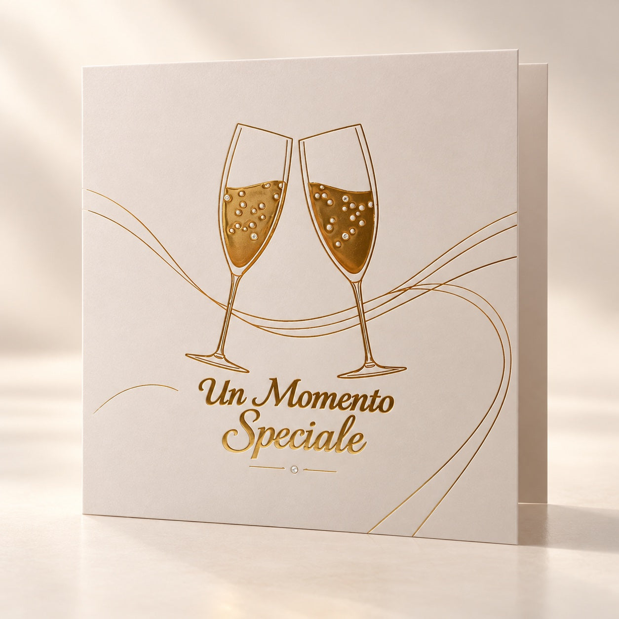 Un Momento Speciale — biglietto con calici dorati